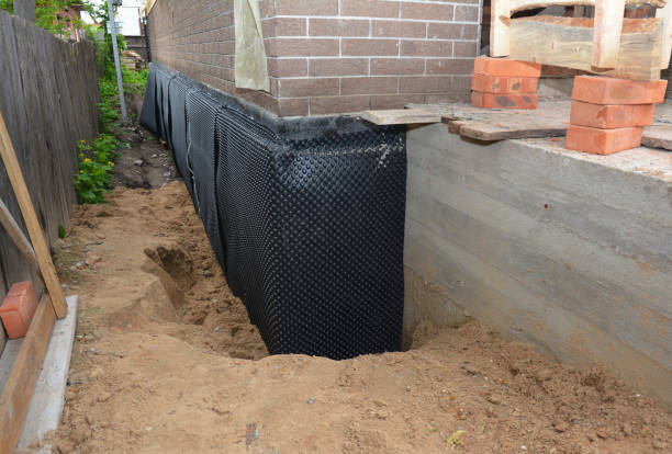 Happy homeowners after waterproofing job in Campbellsburg